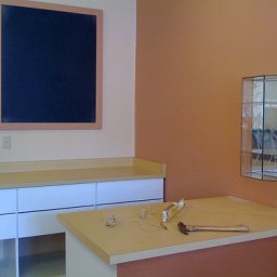 blackboards, countertops and a glass display case