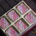 Raspberry truffles in a t box