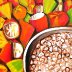 cocoa shells and wet beans in bucket