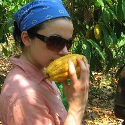 Ginger Smelling a Cacao Pod