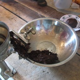 A Corn Mill is Used to Grind the Cacao