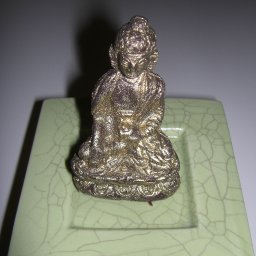 Gold-covered dark chocolate Buddha
