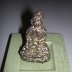 Gold-covered dark chocolate Buddha
