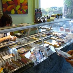 Katrien filling a box of chocolates for us at Patisserie Vercruysse.