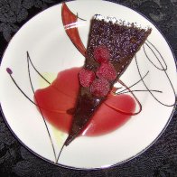 A slice of DJ's Decadent Chocolate Custard Tart by D'Sweets