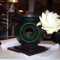 Showpiece base and flower
