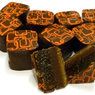 Mango, chocolate and pumpkin seed bonbon