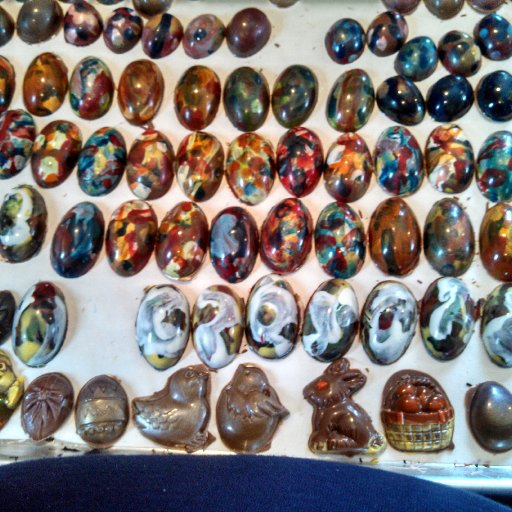 Hand painted eggs filled with Hazlenut Ganache & Painted solids