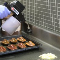 LM25 Spraying Chocolate on Biscuits